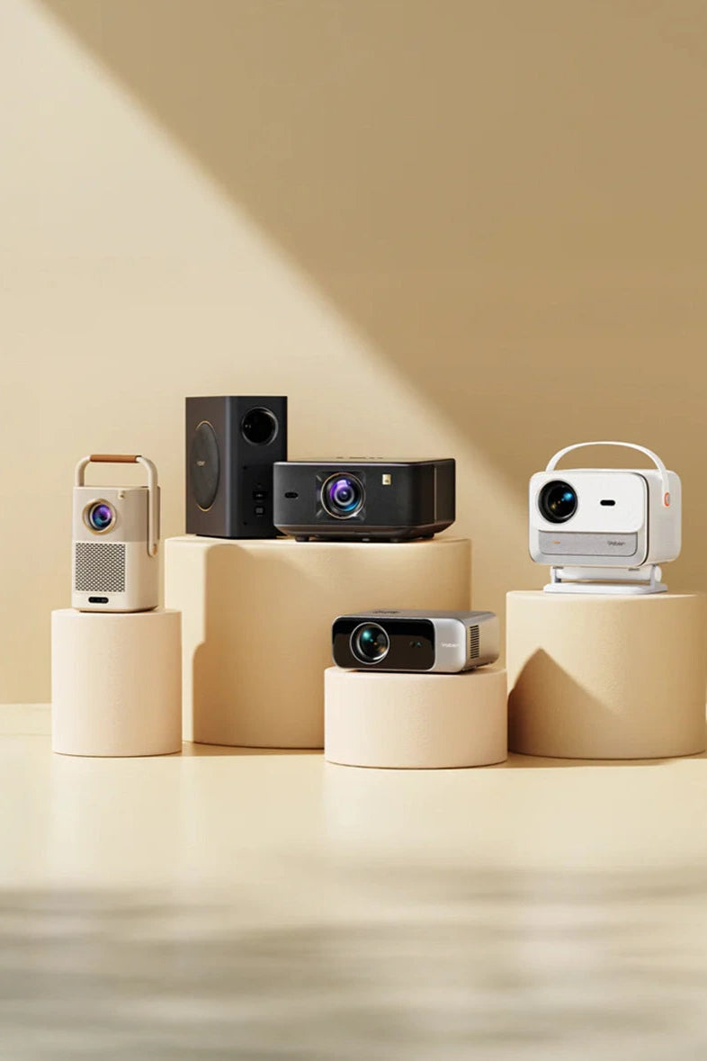 Collection of yaber projectors on against a beige background