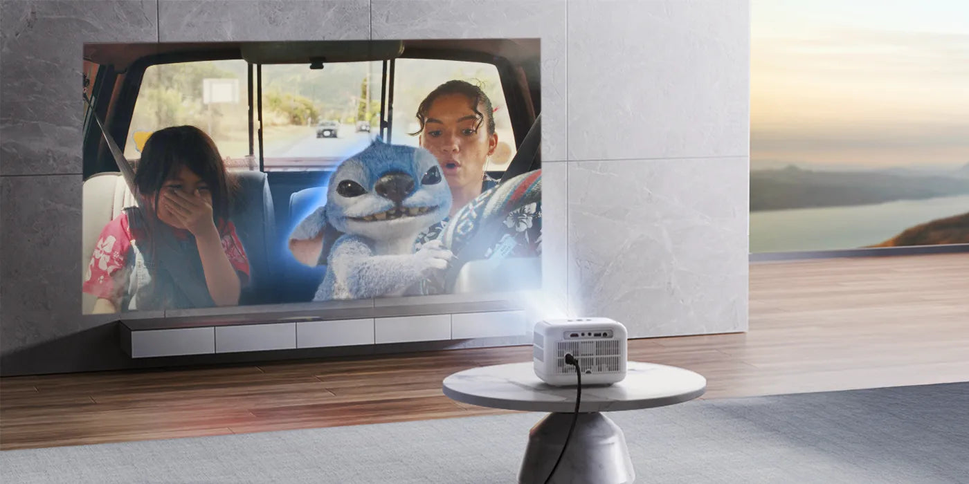 Yaber L1 Projector displaying a cartoon scene on a wall with a scenic background