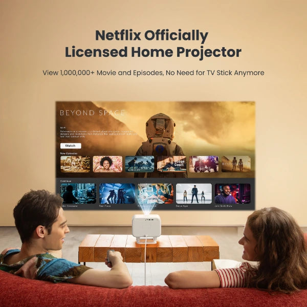 Two people sitting on a couch watching movies projected by a Netflix Yaber Projector L2 Plus