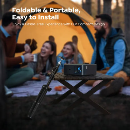 Portable projector on a stand with people around a tent, emphasizing portability and ease of use.